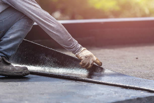 Professional Waterproofing technician working in Woodstock, MD